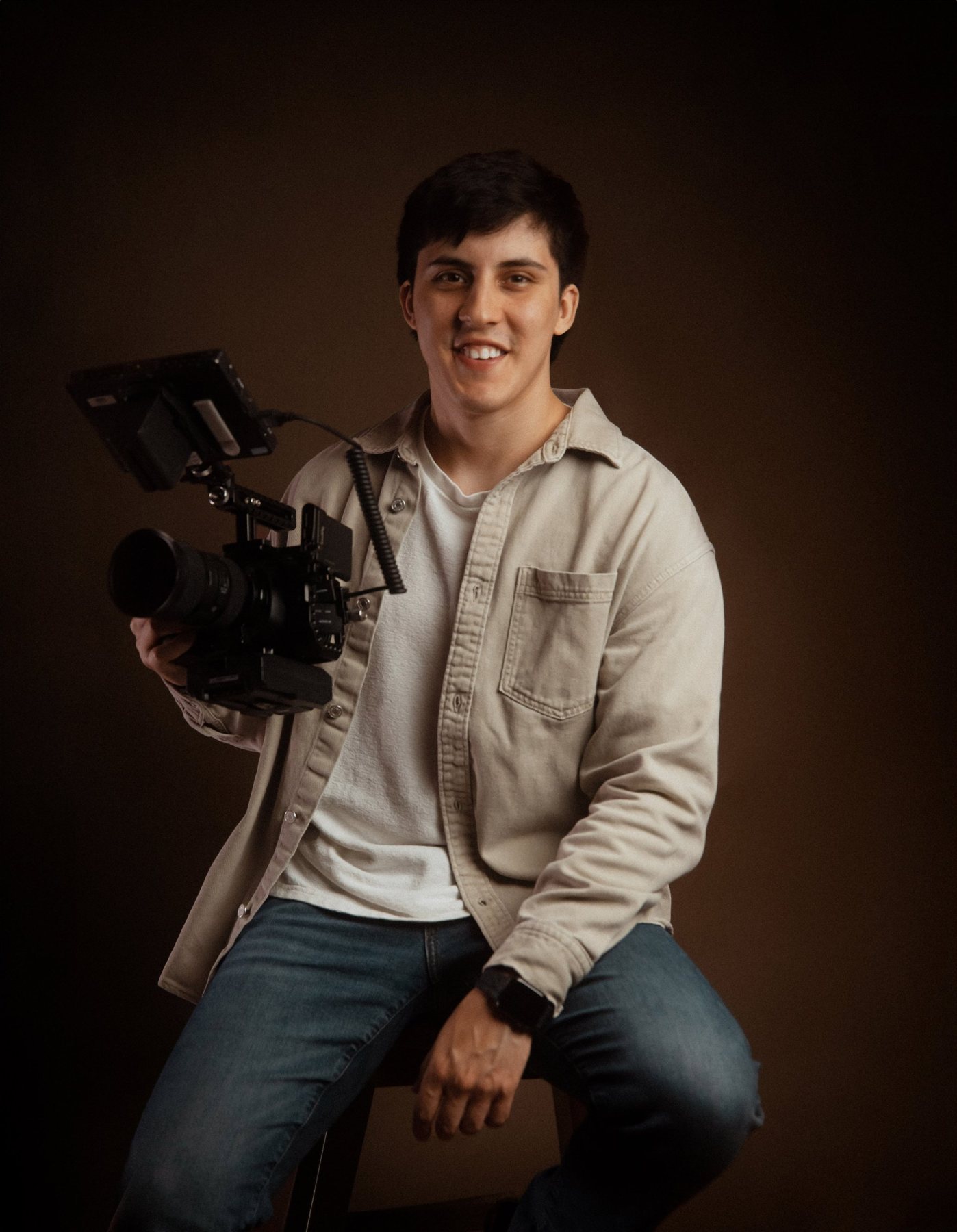 Brock, owner of Visual Authority, holding a cinema camera